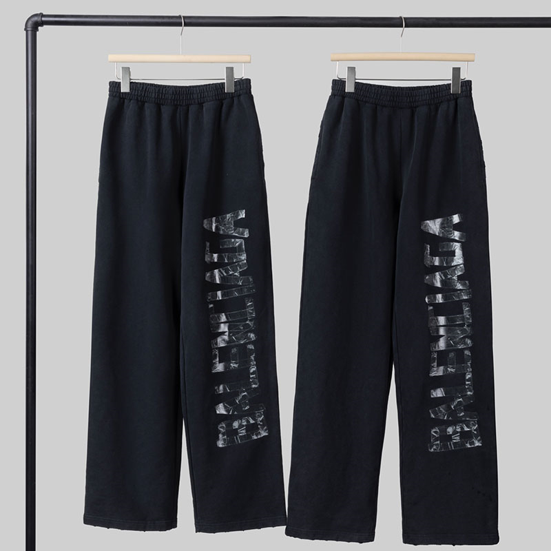 발렌시아가 트랜스페어런트 테이프 배기 팬츠